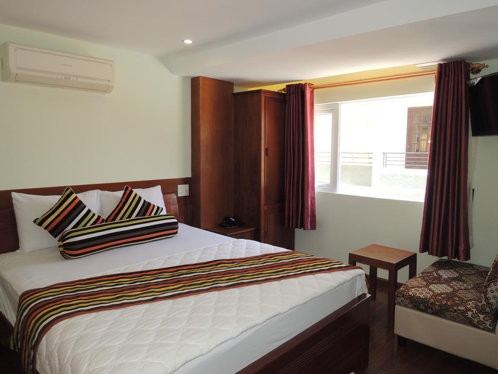 Art Deluxe Hotel Nha Trang Habitación foto